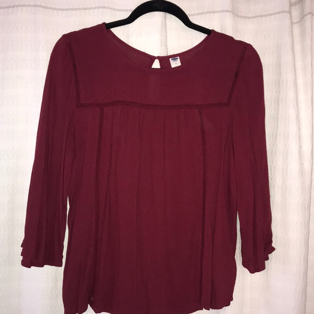 Maroon blouse with detailing in the front